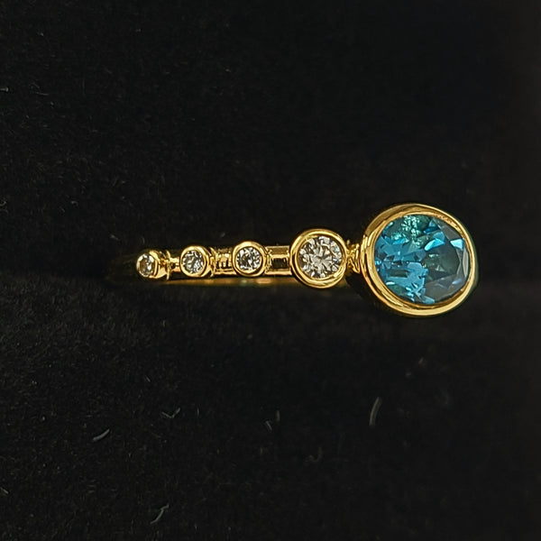 14K Gold Fashion Ring with Blue Topaz Center