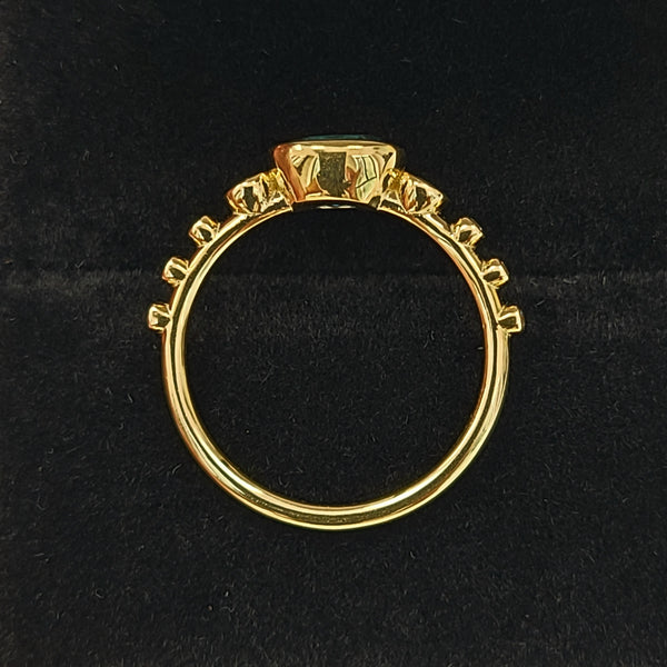 14K Gold Fashion Ring with Blue Topaz Center
